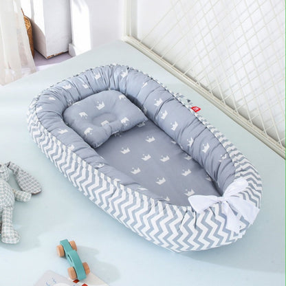 reducteur de lit dans lit cocoon