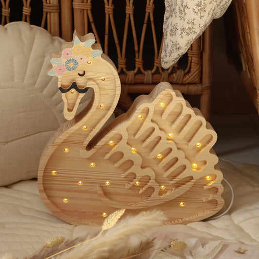 Veilleuse bébé Cygne en ambiance chaleureuse