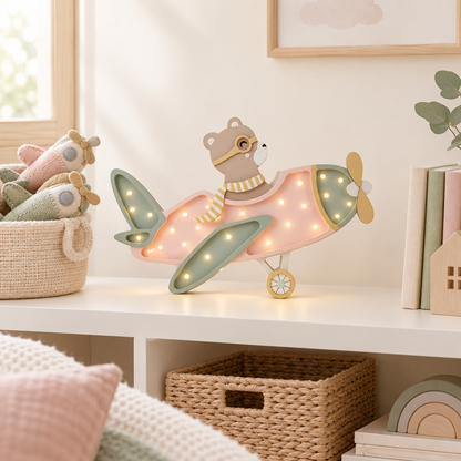 Veilleuse Avion rose sur une étagère scandinave